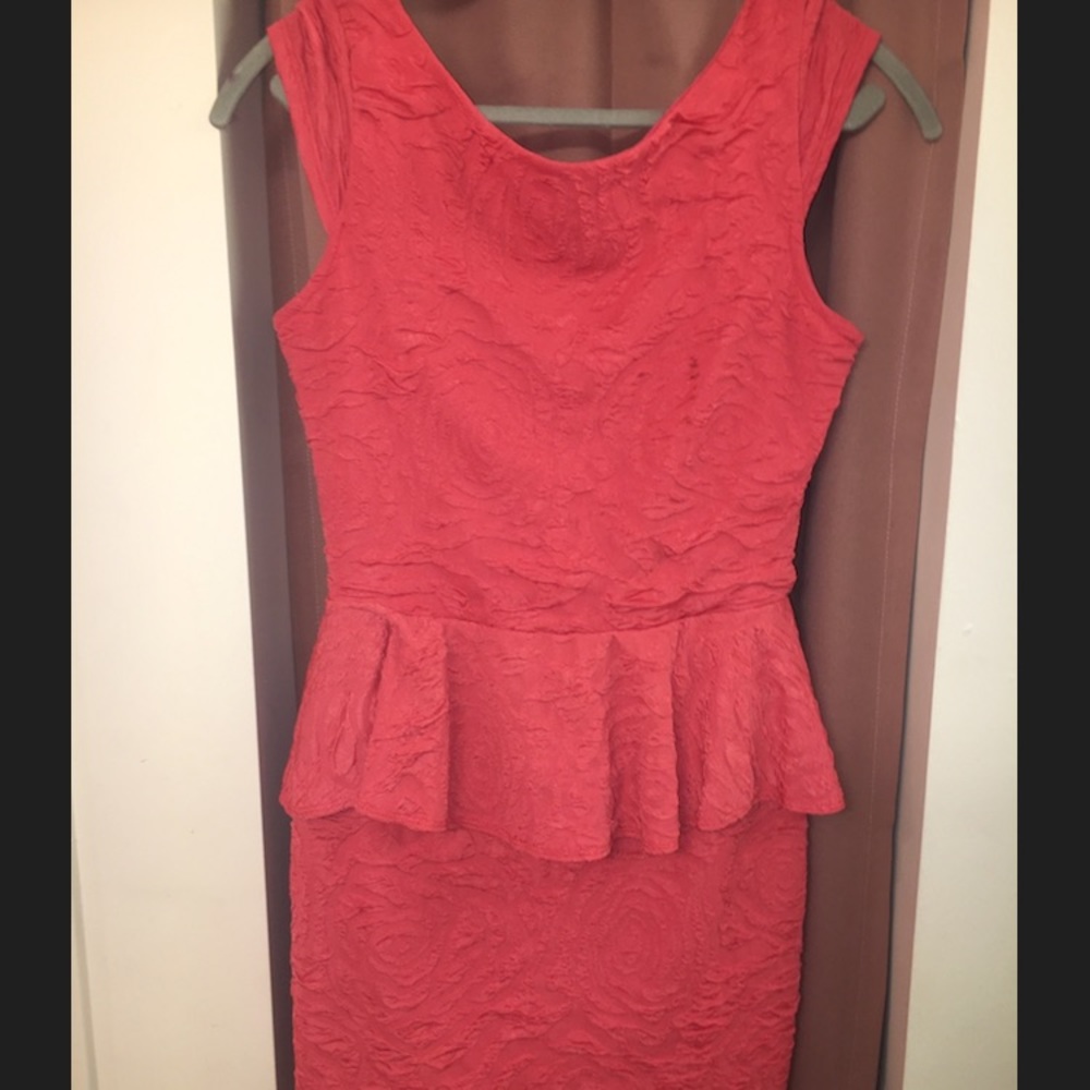 Coral peplum cocktail dress